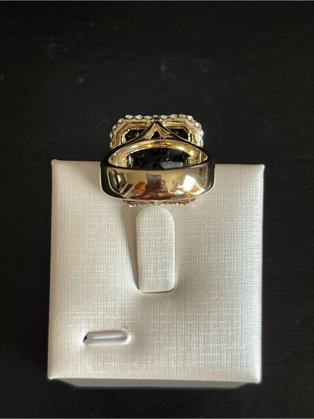 New gold tone simulated smoky quartz ring.
